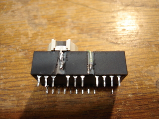 Holder soldered to module pins